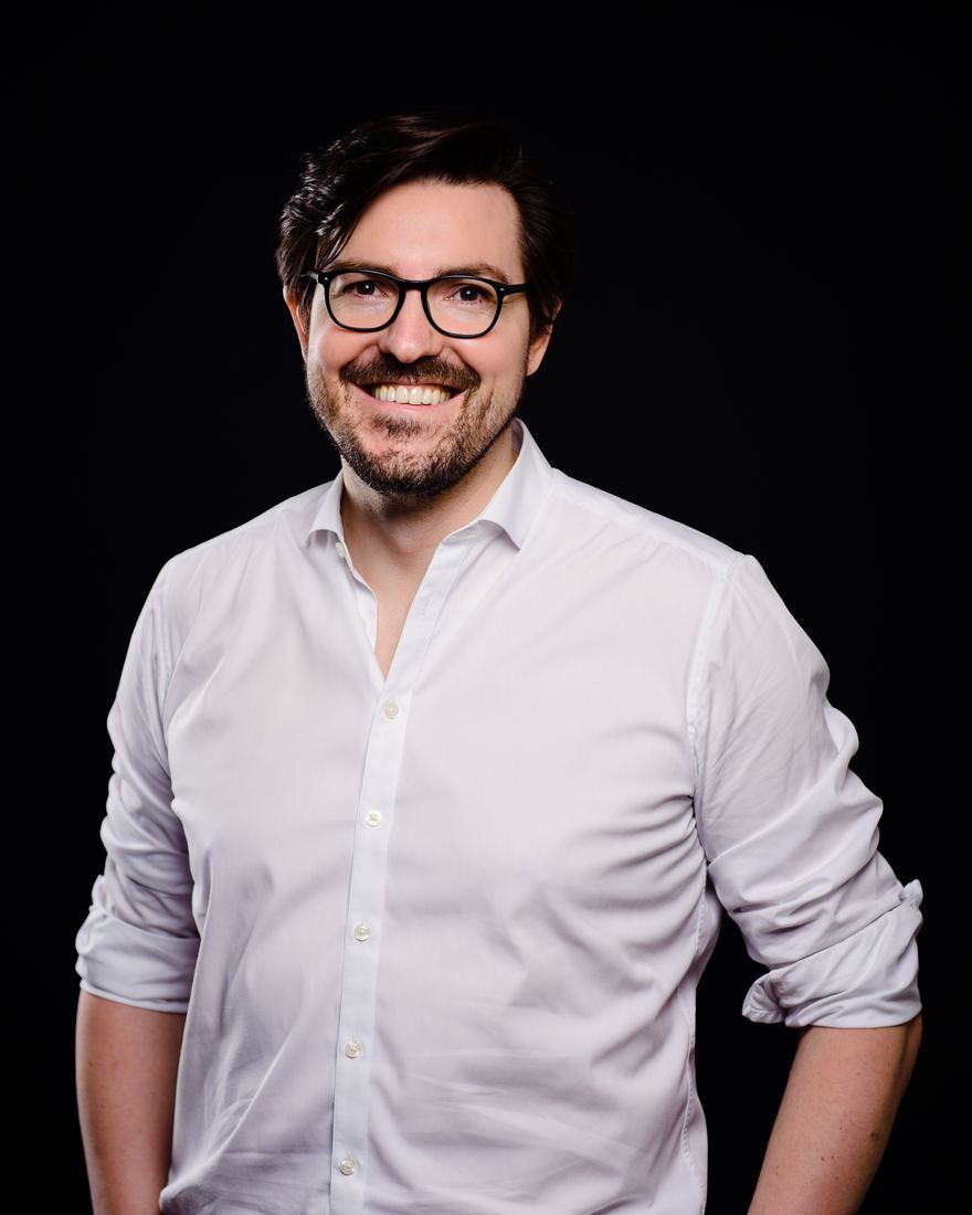 Portrait of Christian Wenzel in a white shirt